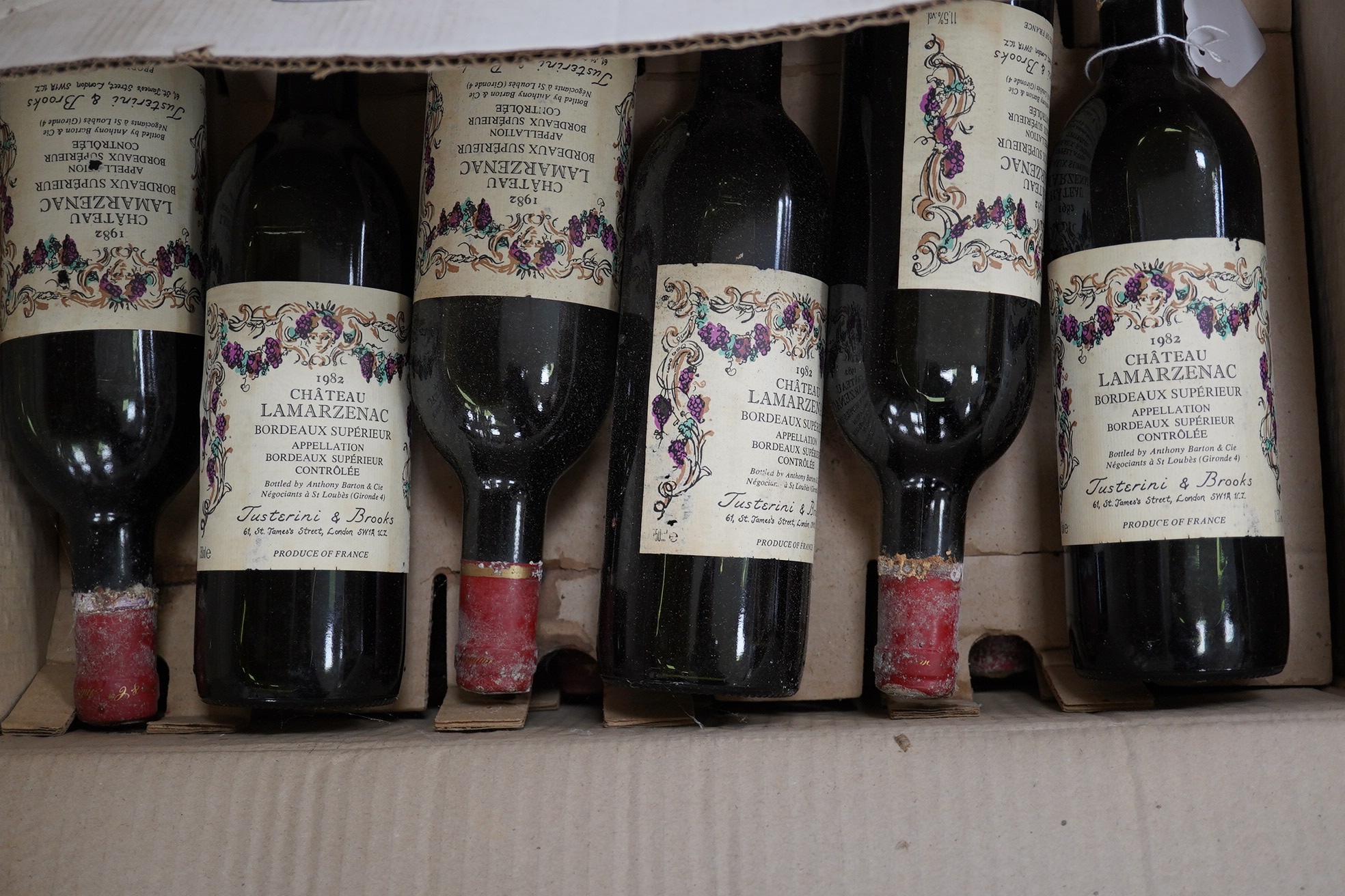 Twelve bottles of 1982 Chateau Lamarzenac Bordeaux Superieur Controlee red wine. Condition - fair, storage history unknown